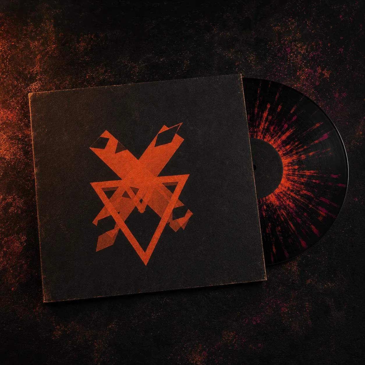 A 12 inch vinyl record half out of its sleeve, the disc an ember-to-magenta splatter, on a painted black table.